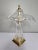 A French crystal and brass desk or table lamp in the modern and Art Nouveau design styles, circa 1960s, Paris, France. The...