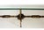 A beautifully crafted example of mid-20th-century Spanish ironwork, this wrought and gilt-iron coffee table combines...