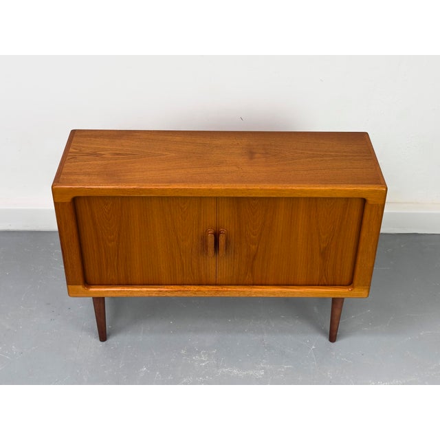 A beautiful and high-quality sideboard from the renowned danish manufacturer cfc silkeborg. The high proportion of solid...
