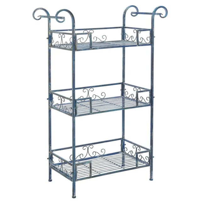 Taking inspiration from Victorian antiques, this Noreen Shelf imbues any outdoor area with vintage charm and romantic...
