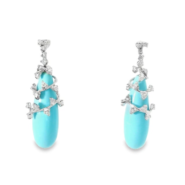 14K White Gold Turquoise Diamond Dangle Drop Earrings. These elegant earrings feature two pear-shaped natural turquoise...