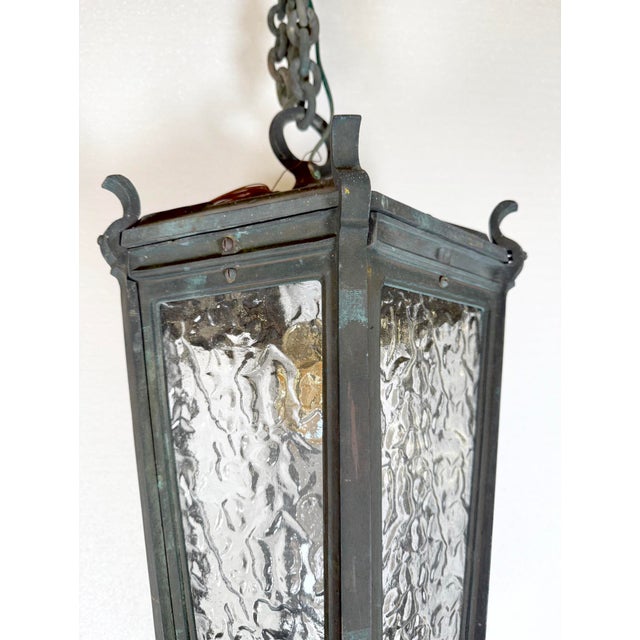 Metal Antique Traditional Bronze Wavy Glass Pendant Light For Sale - Image 7 of 11
