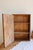 Small antique wooden storage unit, finished with its original brown paint and a soft, authentic patina. Compact design...