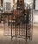 Decorate a wine cellar or wet bar with this elegant antique bottle cabinet. Forged in France circa 1960, the wrought iron...