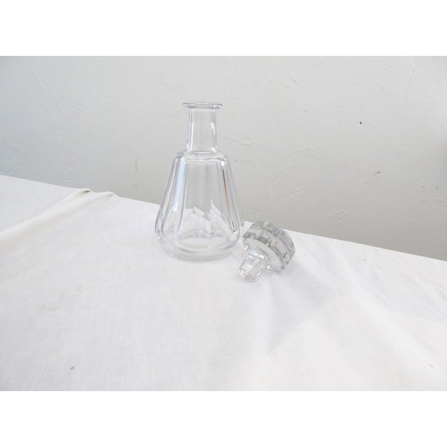 This Baccarat decanter in the Harcourt Talleyrand pattern has the etched Baccarat mark on the underside and is in...