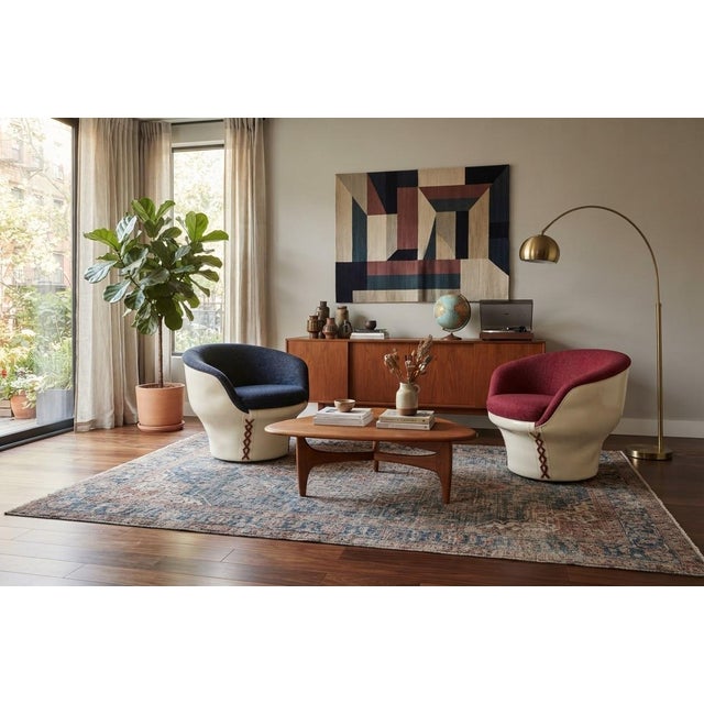 A striking and rare matching pair of Hungarian mid-century modern "Mushroom" space age lounge armchairs, featuring...