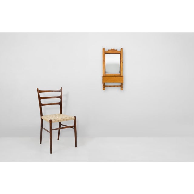 This charming antique shaving cabinet from France, circa 1900, captures the simplicity and craftsmanship of early...