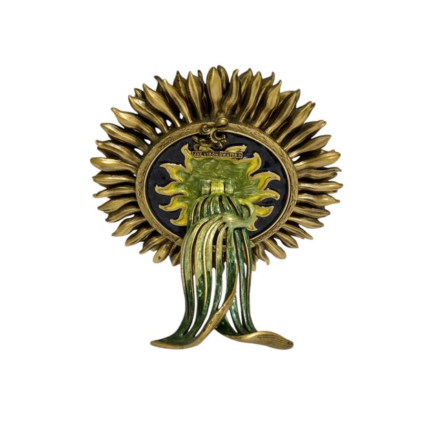 This is a gorgeous, hard to find blue enameled sunflower frame with hand-set Swarovski crystals. The superb craftsmanship...