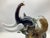 A stunning, thick heavy glass, elephant sculpture. The glass sculpture is in good condition, with no chips or cracks....