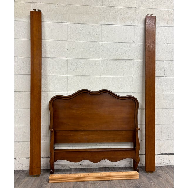 This is an absolutely beautiful vintage walnut French Provincial or Country French style twin-sized bed frame. Includes...