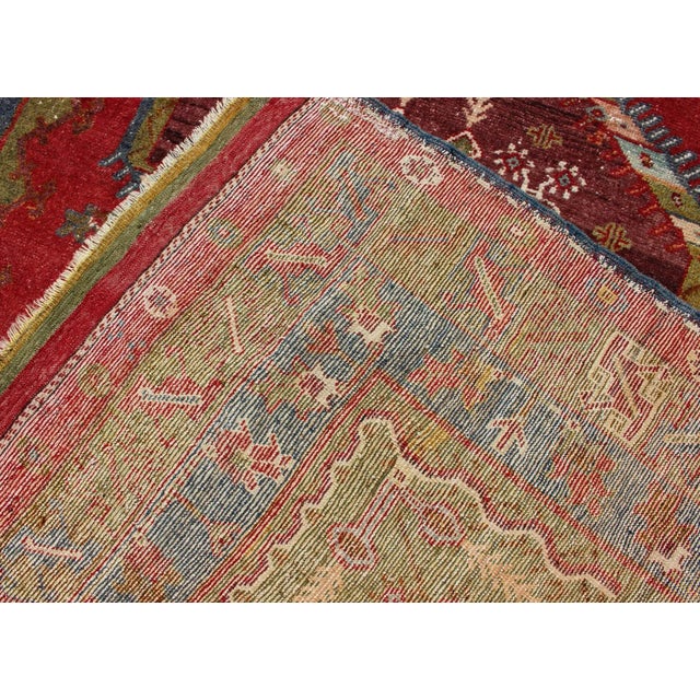 Antique Turkish Medallion Oushak Rug in Red, Green and Blue 6'0 X 8'6 For Sale - Image 12 of 13