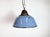 Industrial hanging lamp manufactured by Szarvasi Vas - Fém in Hungary during the 1960s. It features a blue enamel shade...