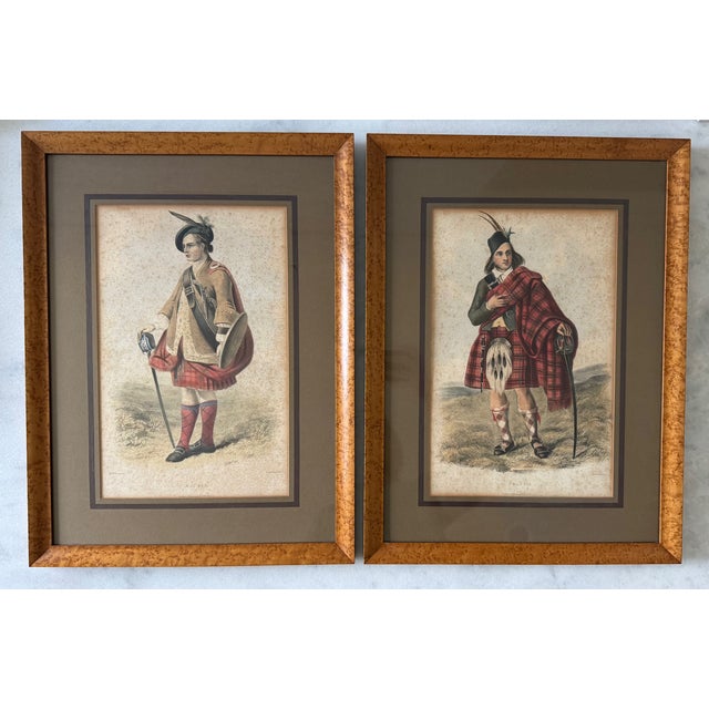 Pair of framed hand colored lithograph prints depicting two of Robert Ronald McIan's (1803-1856) illustrations from the...