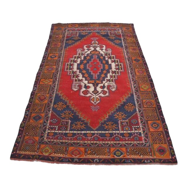 Vintage Anatolian Wool Area Rug, Bold Red Field With Navy Blue Geometric Medallion For Sale