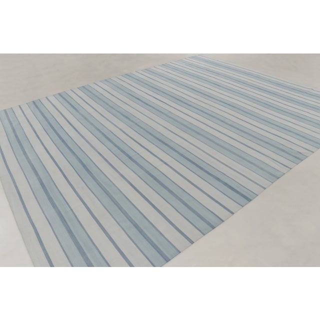 Handwoven in cotton, this 12x15 contemporary oversized flatweave dhurrie rug joins Rug & Kilim’s Dhurrie collection,...