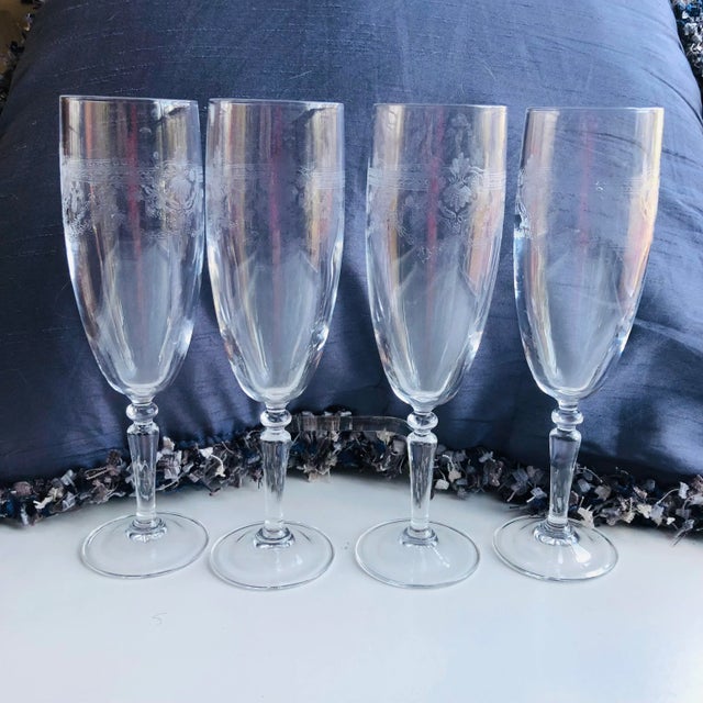 Contemporary set of 4 etched fluted champagne glasses, 1.80"D X 7.5"H , No makers mark in excellent condition.