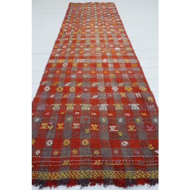 Beautiful vintage Turkish kilim runner rug made pure handspun wool and dyed naturally . Beautiful colors. this vintage...