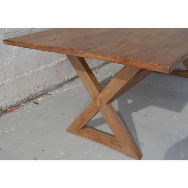 This table is made in our own Los Angeles workshop, using reclaimed heart pine. It is built entirely without nails, screws...