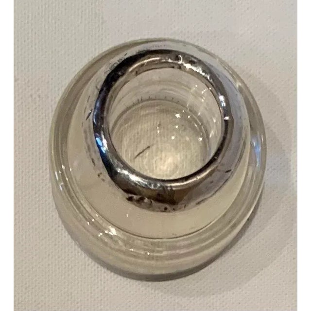 Turn-of-the-century British glass match striker with silver top. Purchased in London in the late 1980s.