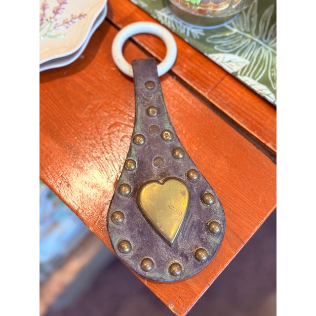 Authentic antique leather oxen tack from Lunenburg County, Nova Scotia, featuring a distinctive brass heart centerpiece...