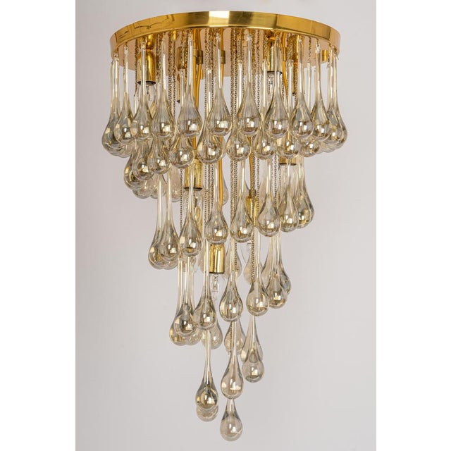 Stunning chandelier by christoph palme, germany, manufactured in the 1970s. It’s composed of murano teardrop glass pieces...