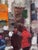 Eastside by Jim Beckner | Oil on panel City street scene with people walking in the rain. For Sale - Image 4 of 4