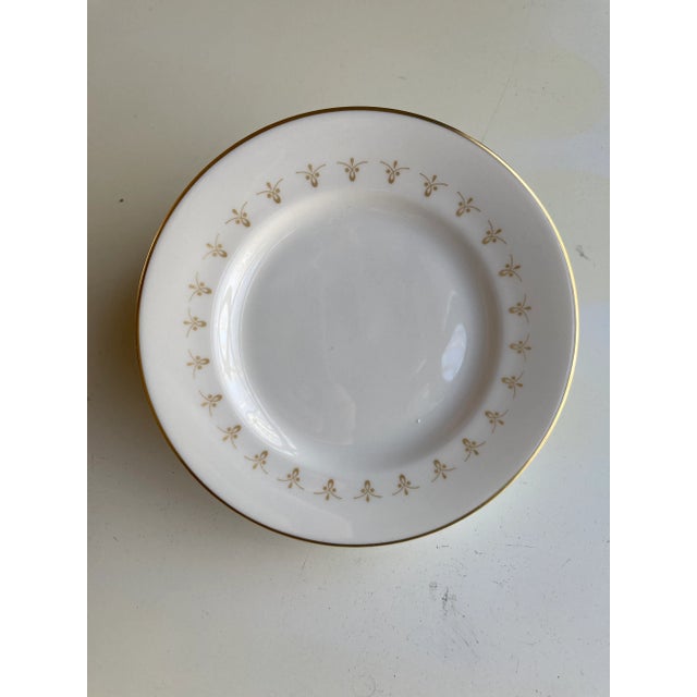 Vintage set of 4 off white and gold bread plates 6.25"D , makers mark reads " Syracuse China Made in America" First Love...