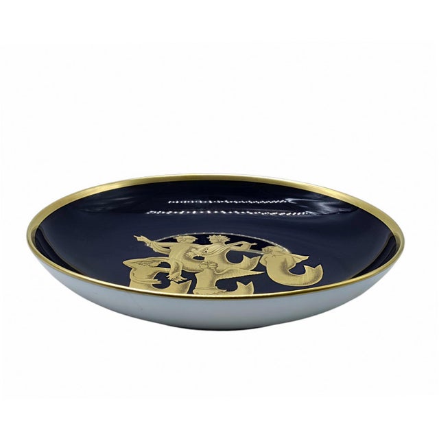 An elegant porcelain plate from the famous ‘Migration of the Sirens’ collection, designed by Gio Ponti for Richard Ginori....