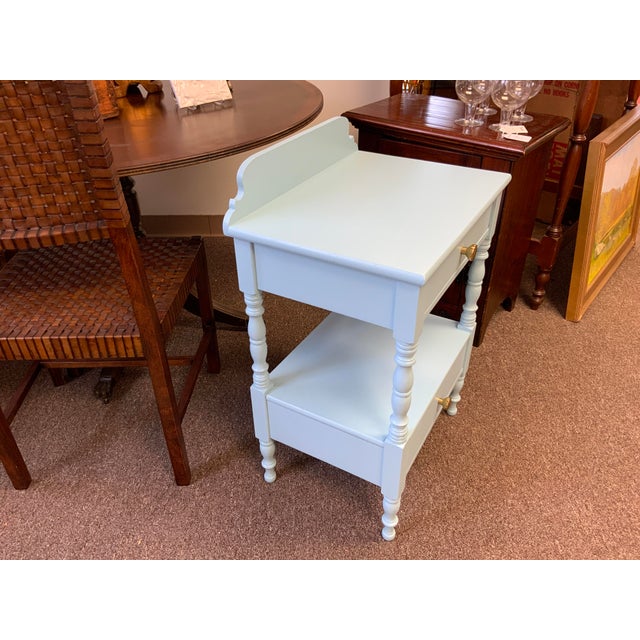 20th century Hitchcock painted side table. Two drawers and open shelf, great storage solutions. Original knob pulls have...