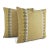 The fabric has gold, tan, and cream woven threads in a mini herringbone pattern. The pillow is embellished with trim by...