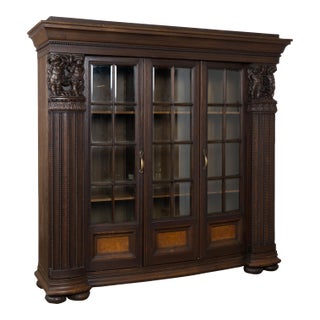 20th Century Danish Oak Display Cabinet With Carved Putti and Beveled Glass For Sale