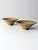 A pair of vintage handmade studio pottery bowls featuring a richly layered glaze in warm tan tones with dark brown and...
