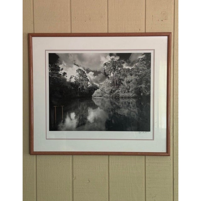 BUTCHER, Clyde, (American, b. 1942): "Trapper Nelson’s” Special Edition Photograph, 20" x 24", signed lower right,...