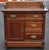 A Victorian Renaissance Revival Style Mahogany and Marble Top Side Cabinet/ was stand. Measuring 30" in width, 16" in...