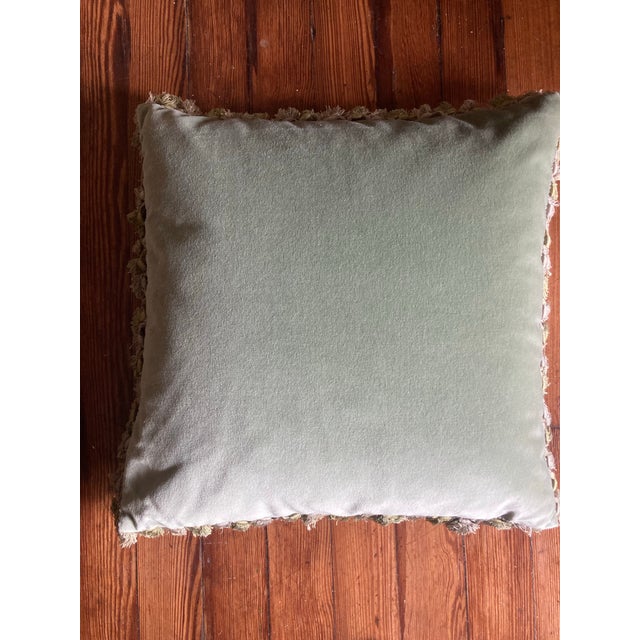 Very pretty authentic 19th century down filled French Needlepoint pillow. It has beautiful fringes and the back is velvet....