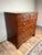 A handsome late Georgian English mahogany chest of drawers dating to the turn of the nineteenth century, this elegant...