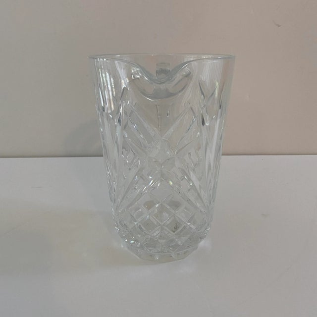 This vintage French crystal pitcher was found at a small home in the Shenandoah Valley of Virginia. It is adorned with fan...