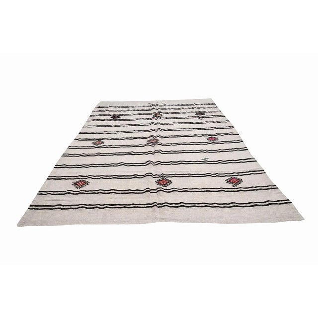 Handwoven vintage hemp kilim rug from Yozgat region of Turkey. Approximately 45-55 years old. In very good condition.