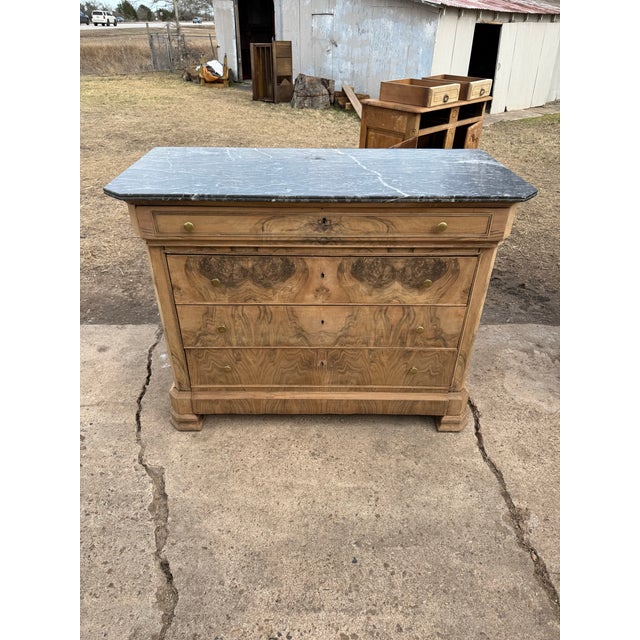 19th Century French Louis Philippe Commode from France. Made of Burl walnut, with a Saint Anne marble top slab, the wood...