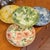 This is a set of four ceramic plates featuring exquisite floral patterns. These plates are a wonderful way to add color...