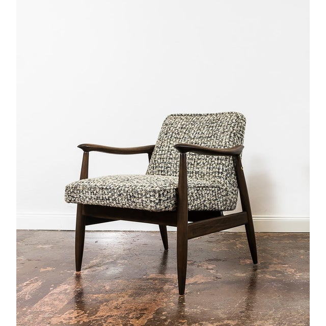 A gfm-87 armchair designed by juliusz kędziorek, manufactured at the gościcińska fabryka mebli (gfm), poland, in the...