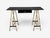 Jacques Adnet atrribution, Desk, Black Leather, Enameled Steel, Brass, France, 1950s A wonderful desk attributed to...