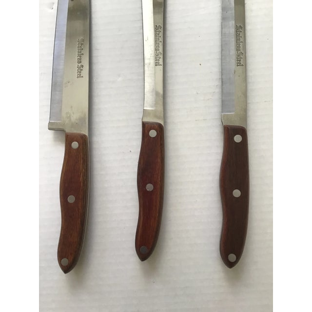 Mid Century Danish Carving Knife Set (4) 3 says Interpur Japan .... Stainless Steel 1 says Ekco Stainless Steel (smallest...