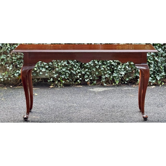Classic Queen Anne style cherry console table from Ethan Allen’s iconic Georgian Court Collection. Beautifully shaped...