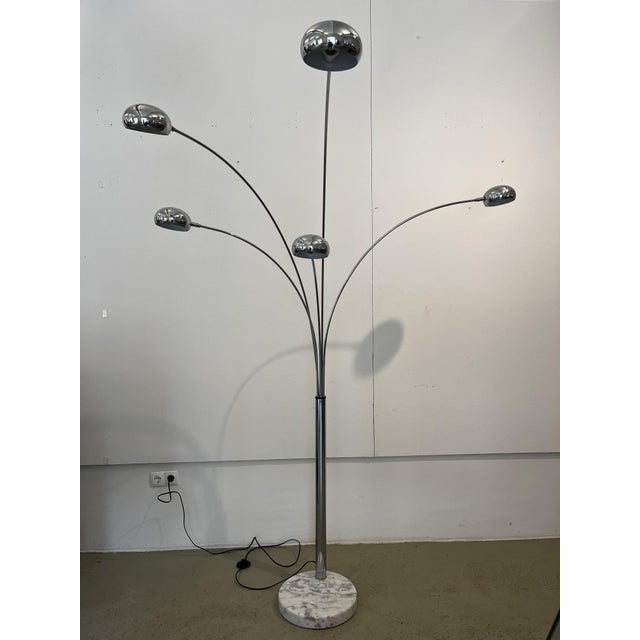 A beautiful arc lamp from the 1970s, likely made by Cottex, Sweden. The five arms can be moved and positioned in all...