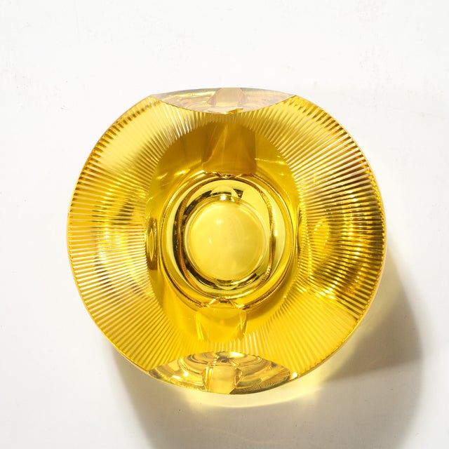 A Mid-Century Modernist citrine crystal ashtray signed by Moser, Italy, circa 1970, embodies both refined functionality...