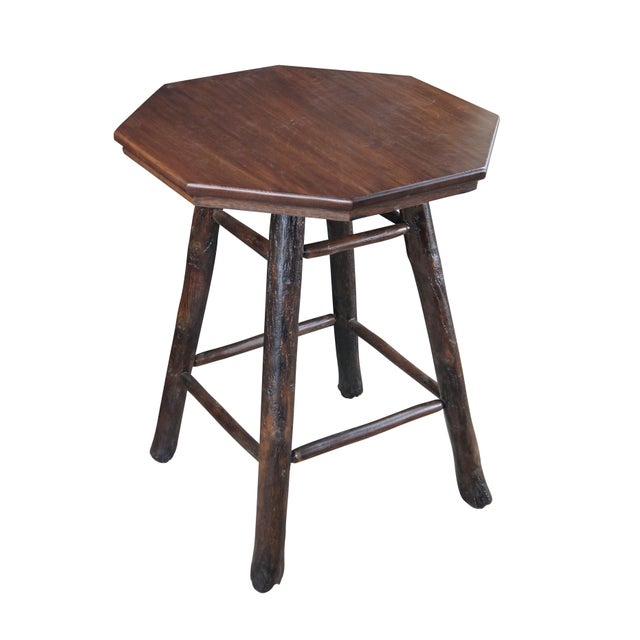 Vintage Old Hickory style farmhouse / lodge accent table. Made from rustic natural tree branch / logs with octagonal...
