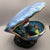 This intricately crafted ceramic clam shell lamp base, bearing the Vallauris mark, showcases vibrant marine life details...