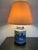 A stunning ginger jar shaped, blue and white, chinoiserie table lamp with a double light fixture. This large lamp displays...
