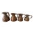 Set of Four Antique Graduated English Haystack Copper Jugs For Sale